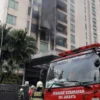 Apartemen Pavilion Kebakaran, 140 Petugas Dikerahkan dan 33 Penghuni Berhasil Dievakuasi
