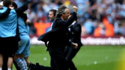 Roberto Mancini saat menangani Manchester City dan merayakan gelar Liga Inggris 2012.